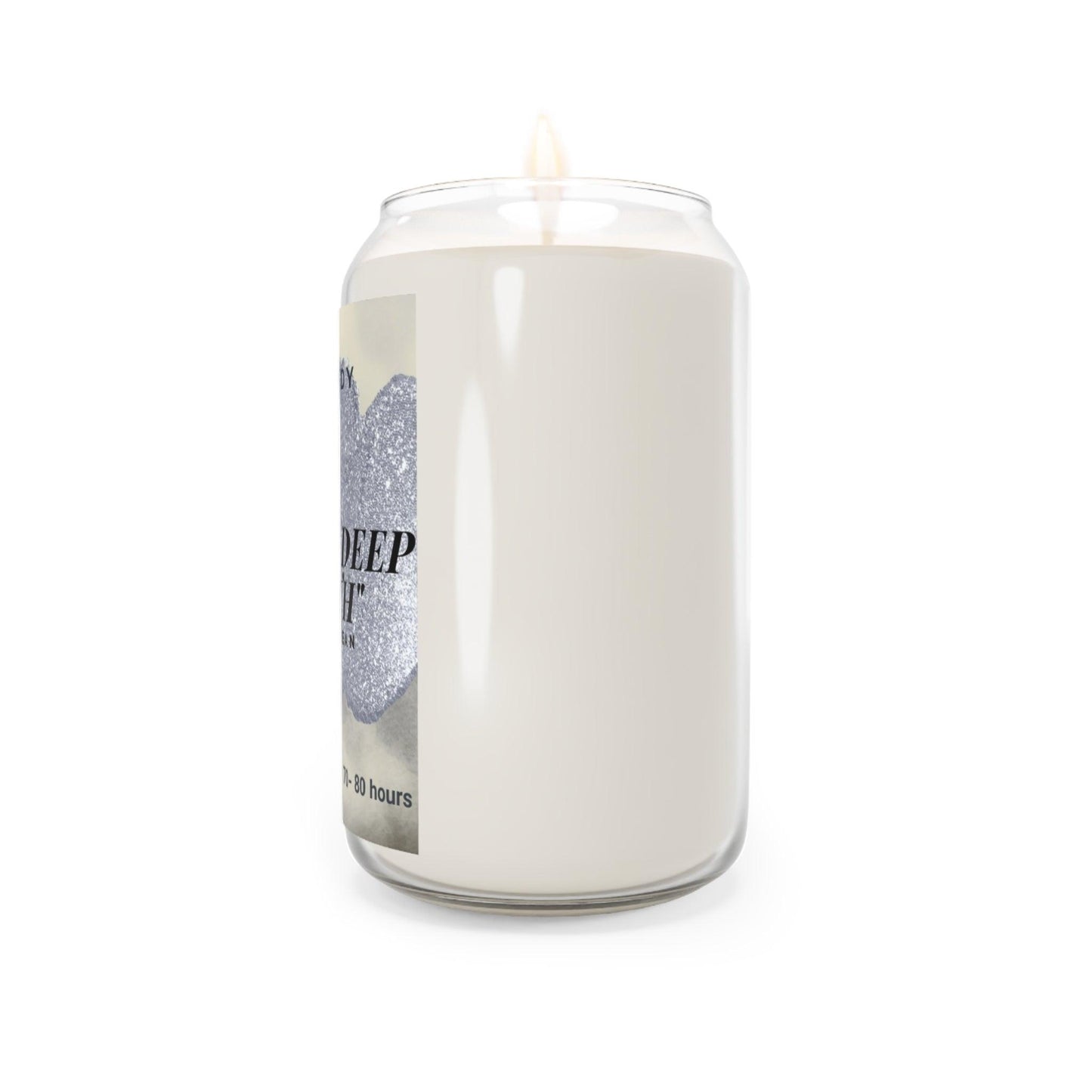 Vanilla bean aromatherapy candle in a clear glass jar with a decorative label