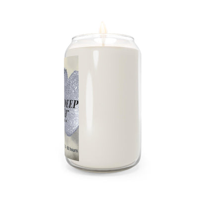 Vanilla bean aromatherapy candle in a clear glass jar with a decorative label