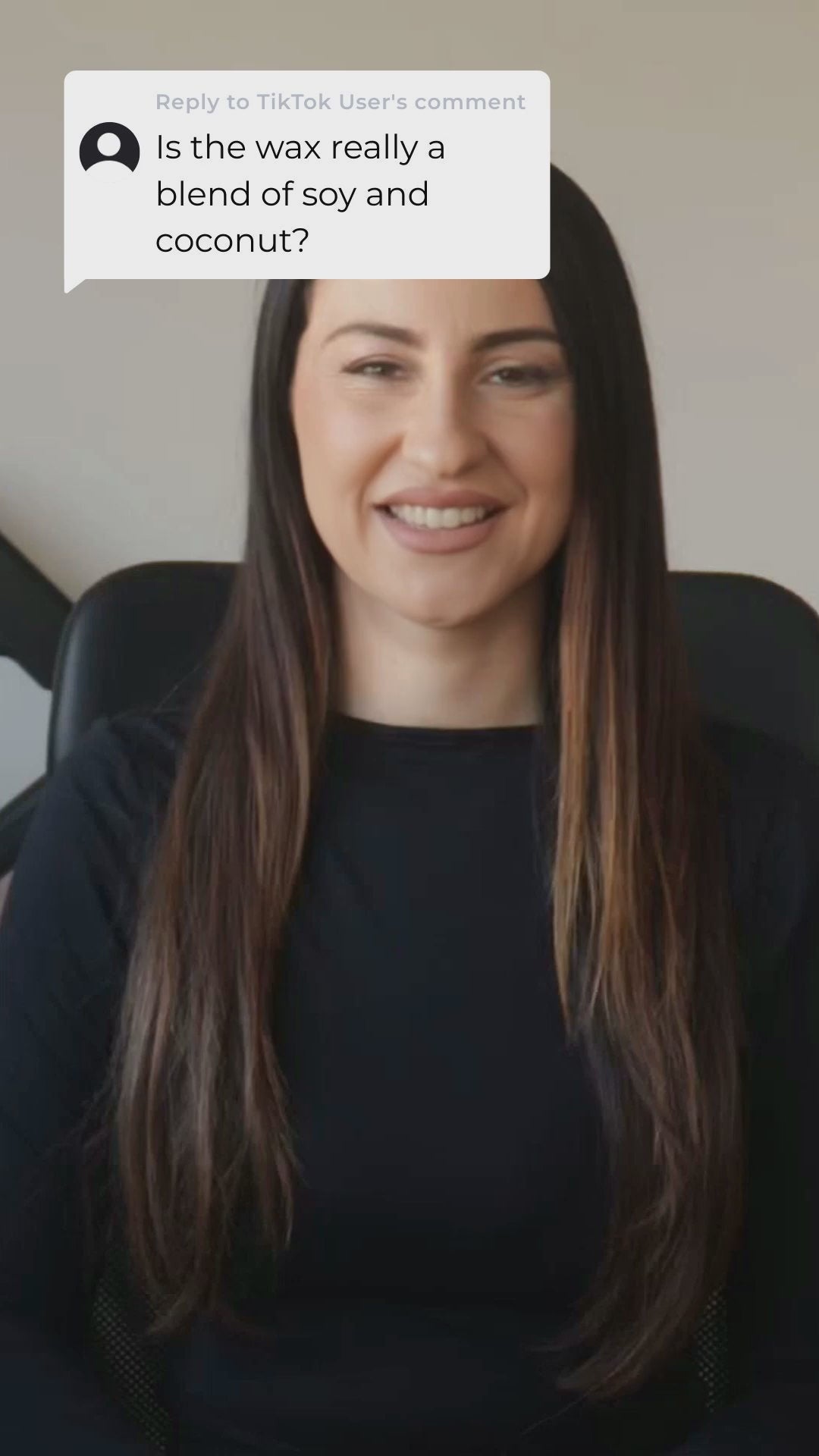 Person answering a question about the soy and coconut blend in a candle's wax.